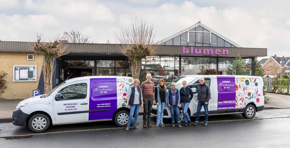 Team-vorm-Blumenhaus